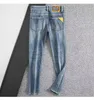 Diseñador de jeans para hombres Classic European Men's Jeans Presbyterian Monogram Bordado Estado de tendencia lagrimal Pantalones de motocicletas para hombres Slim VBi7