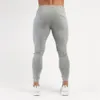 Pantalon masculin joggeurs d'automne pantalon de survêtement en coton coulant trackpants gym de gym de fitness pantalons maigres