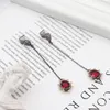 Brincos de design europeu e americano moda girassol pedra vermelha joias para mulher tendência 2023