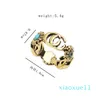 luxo- Anéis de banda de letras de marca banhados a ouro 18K para homens e mulheres, designer de moda, letras de marca, cristal turquesa, metal, anel de margarida, joias tamanho único