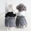 Hundkläder vår sommar svartvitt flygande ärm pläd kjol personlighet husdjur klädkatt söt båge valp klänning