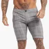 Shorts masculinos Shorts masculinos com design de botão de moda 2023 Verão novo estilo britânico Shorts finos casuais esportivos Calças de 5 pontas Cinza Joelho L230719