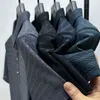 Polos de los hombres de malla de seda de hielo polos huecos 2023 verano Corea moda transpirable camisetas sueltas hombres ropa de manga corta camiseta Ropa 230718