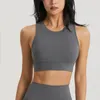 Tenue de yoga couleur unie Fitness Sport soutien-gorge dos croix boucle femmes sous-vêtement haut avec coussin de poitrine haute résistance entraînement complet Jog