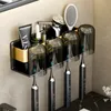 Portaspazzolino Portaspazzolino elettrico Fissato al muro No Drill Storage Organizer Dentifricio Spazzolino Portabicchieri Accessori per il bagno 230718