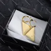 Klassiska Gold Hoops Stud Inverterade Triangel Designers Earring Party Eardrop Womens örhängen Lyxbrevsmycken