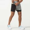 Mäns shorts Summer Sports Shorts Män Fake Two Piece Light and Tight Elastic Basket Basket Kör snabbt torkande dubbelskikt Fitness Pants L230719