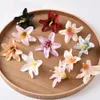 50 pz/lotto Orchidea Artificiale Fiore di Seta Testa 7 cm Per La Casa Decorazione di Nozze Corona FAI DA TE Regalo Scrapbooking Mestiere Fiore Finto 2253