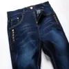 Whole-2016 Nuovi jeans blu bianchi maschili Robin Men Jeans Slim Denim Skinny Pants Skinny Pants Cowboy High Fashion Famoso design257H