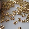 Nail Art Decorations 100 pieces/batch Mini Bow Knot Metal Nail Decoration Korean Rose Gold 3D DIY Handle Ribbon Gold Bow Knot Alloy Nail Decoration 230718