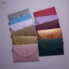 اندفع 100pcs 10 5cmx7cm ورقة لؤلؤة لطيف لطيف ملونة الفراشة المشبك مغلف