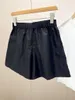 Summer Women's Black Elastic Loose Shorts, Nylon Fabric är mjukt, bekvämt och andningsbart, elastiskt enkelt och praktiskt, lösa version av avslappnad mode.