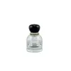 Parfymfyllbar flaska lyxig rundform svart lock täcker kosmetisk förpackning 1 oz 2oz 3oz tomt klart glas atomer crimp pump spray mist flaskor 30 ml 50 ml 100 ml