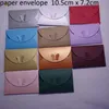 اندفع 100pcs 10 5cmx7cm ورقة لؤلؤة لطيف لطيف ملونة الفراشة المشبك مغلف