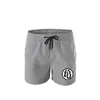 Sommermodemarke Sportshorts neue lässige atmungsaktive Viertelhose einfarbige grundlegende Basketballshorts Männer L230719