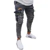 Abbigliamento moda uomo Pantaloni jeans cargo Pantaloni da lavoro skinny strappati da uomo Street Wear Pantaloni tinta unita di alta qualità202V