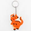 Dessin animé dinosaure porte-clés PVC caoutchouc pendentif mignon 12 dinosaures forme porte-clés porte-breloque mignon bibelot mode sac pendentif cadeaux