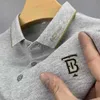 Camiseta masculina polo americana de manga curta tendência solta verão na moda marca negócios casual nova lapela top masculino tb