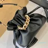 2023-handväskan Designer Bag Comen Classic ImitationStitching Black Leather Letter Drawcord Shoulder Bag Versatile Pommuter Chain Party Wallet