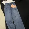 23SS FW Women's Designer jeans byxor med brev broderi mönster flickor bomull vintage high end milan banan varumärke avslappnad solid outwear denim bred benbyxor