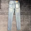 Jeans pour hommes Jeans pour hommes Pantalon de créateur violet déchiré droit Denim régulier Larmes en vrac lavé Chg23071919