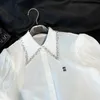 23ss nieuw shirt ontwerper blouse lente zomer polo kraag strass korte mouwen top brief borduurwerk bladerdeeg mouw vest shirt dames