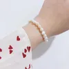 Bracciale rigido con perle d'acqua dolce barocche naturali da 7-8 mm, chiusura OT dorata, bracciale a catena estesa lungo 20 cm