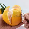 Descascador de limão Citrus Descascador de laranja aberto tipo dedo Dispositivo Aço inoxidável Descascador de laranja Ferramenta de descascamento de frutas para cozinha TH0965