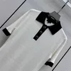 23SS Kobiety z literami przyciski pasa startowego Designerskie Tops Projektowne bawełniane sukienki zbiornikowe Ubranie Wysokiej klasy elastyczność A-line BodyCon spódnica