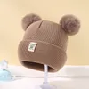 Cappello a doppia sfera per bambini in lana tinta unita in acrilico Cappello lavorato a maglia con etichetta in tessuto per bambini autunno e inverno DH057