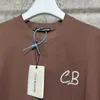 TShirts homme high street oversize CB marron Tshirt slogan patch broderie Cole Baxton étiquette de doublure 230718