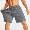 Shorts masculinos verão shorts esportivos masculinos novos soltos casuais elásticos gravata de malha fibra de poliéster fitness alta elasticidade 5 pontos calças L230719