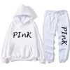 Trainingspakken voor heren Casual 2-delige sets Roze set voor dames Briefprint Grote maten sweatsuit Mannelijke top Ans skinny broek Twee sportpakken