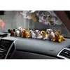 Decorazioni per interni Resina Scuotere la testa Decorazioni per cani Cucciolo Testa che oscilla Cane Bobblehead Giocattolo Figure di animali Ornamento per auto Decorazione Cruscotto per auto Testa di cane x0718