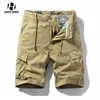 Mäns shorts herrar sommar bomull lös last shorts 2023 ny mode avslappnad multi ficka korta byxor män khaki taktiska overaller shorts l230719