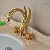 Grifos de lavabo de baño con forma de cisne de Vidric, grifo de lavabo dorado de doble manija, grifo mezclador montado en cubierta generalizada con Wat frío