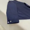 Casaco de camisa de manga comprida de náilon de lapela azul para primavera e verão, tecido de náilon macio e confortável, versão de camisa solta de estilo casual de negócios.