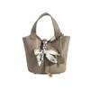 Designer Picotin Lock Bag New 2023 Moda feminina Litchi Padrão casual portátil Balde de água sólida Casquete de seda vegetal Handbag Handbag L35i