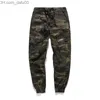 Pantalons pour hommes Pantalons pour hommes Mode Camouflage Jogging Pantalons Femmes Zipper Salopette Faisceau Pied Pantalon Irrégulier Joggers Pantalon Z230720