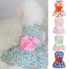 Ropa para perros Verano Estampado floral Pequeños perros medianos Vestido Encantador Bowknot Decoración Sin mangas Pata delantera Vacaciones Traje para mascotas