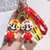 Partihandel Byggnadsdockan Key Chain Small Presentbiltillbehör PVC Cartoon Key Chain Cartoon Bag Pendant