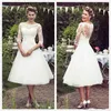 Abiti da sposa in pizzo corto stile vintage anni '50 Mezze maniche Tulle Applique in pizzo Lunghezza tè Abiti da sposa con bottoni C265y