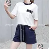 Kvinnors spårsättningar Casual Girls Tee Dstring Letter Designer Shorts Summer Women Short Sleeve T Shirts 2 Piece Set Drop Delivery Appa Dhvyu