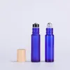 1 3OZ Empty Packaging Glass Roller Cosmetic Bottles Clear Blue Amber Frosted Colors with A and B Metal Ball Plastic Wooden Grain Lids Ufkbu