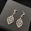 Diamond-filled flash crystal water drop shaped earrings, jewelry designer, women's earrings, Wedding banquet gifts Dance