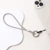 Cordão para celular feminino luxo completo com pingente de diamante anti-perda Corrente de pulso curta Acessórios para joias de telefone L230619