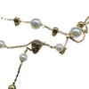 Nya designade dingle pearl tassel damörhängen asymmetriska skalle skelett mikroinlägg diamanter kvinnor dubbel lager skalbagge halsband276z