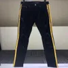 Jeans masculino joelho rasgado com borda dourada e acabamento prateado com brilho rosa listrado calça justa preta de alta qualidade 271Z