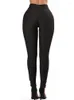 Kvinnors leggings hål ut yogapants Gym Sexig kvinnor Bandage svart elastiskt solid streetwear leggins som kör strumpbyxor