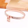 Joyería de diseñador de lujo de alta calidad Pulseras de mujer Brazalete de acero inoxidable Pave Silver Rose Gold Tone Charms Lock Bangle Je246o